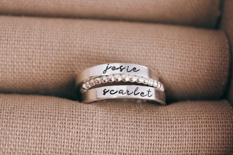 Set of 2 Sterling Silver Name Rings with 1 Spacer - Arial Font